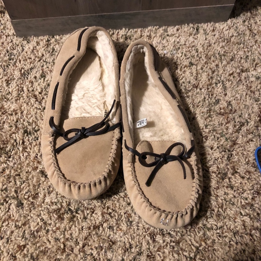 Tan moccasin slippers